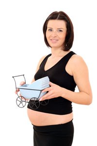 εγκυος γυναίκα με κούνια